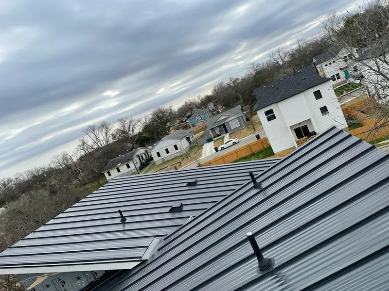 Standing seam metal roof panels with vents for Skylight Repair in Hoboken